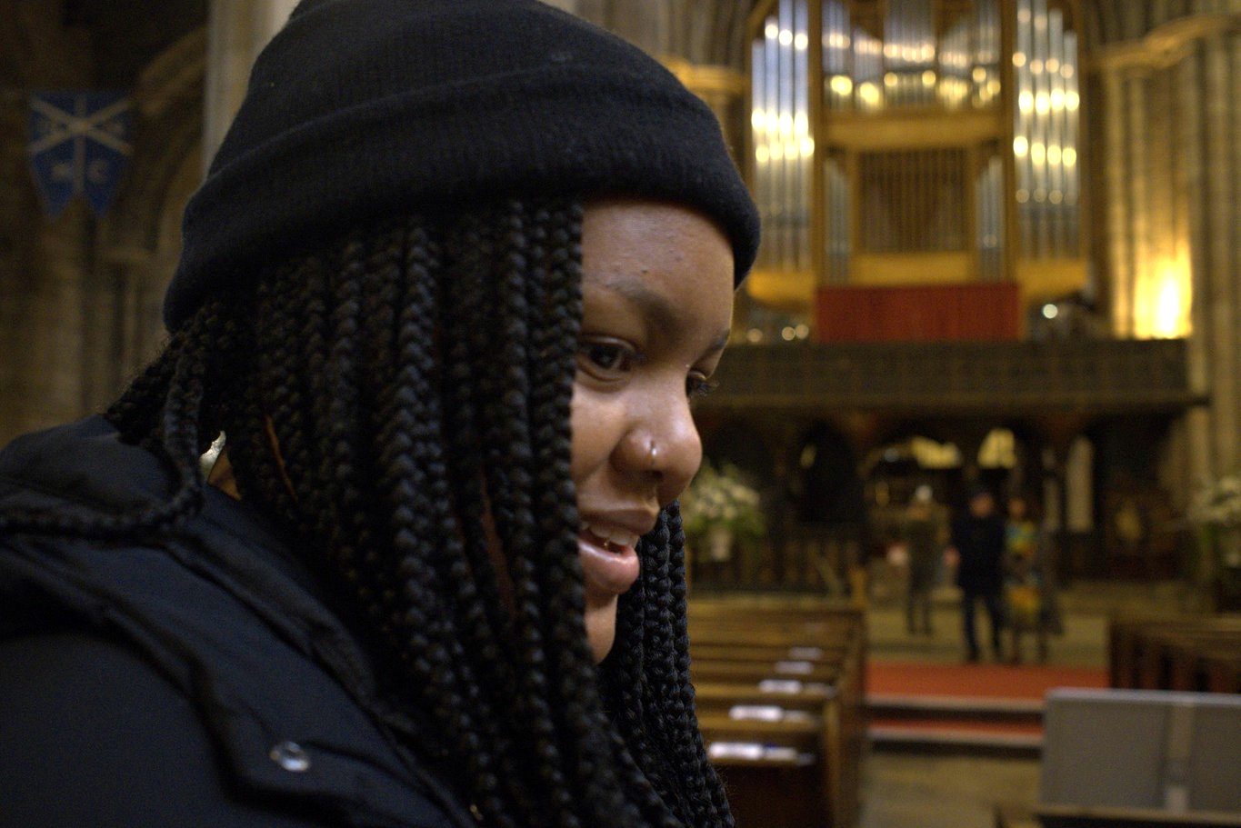 Jessica Nyassa in a cathedral interior