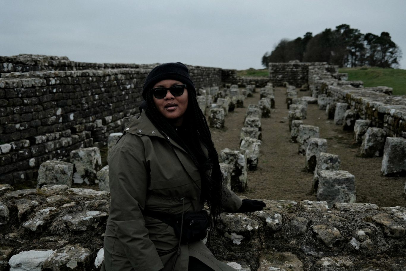 Jessica Nyassa among the excavated remains of a Roman fort
