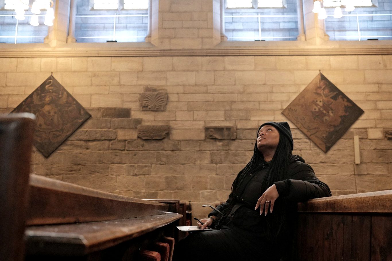 Jessica Nyassa working in a cathedral interior